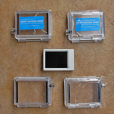 Lieferumfang: LCD BacPac, vier verschiedene Deckel für die Einhausung der Kamera